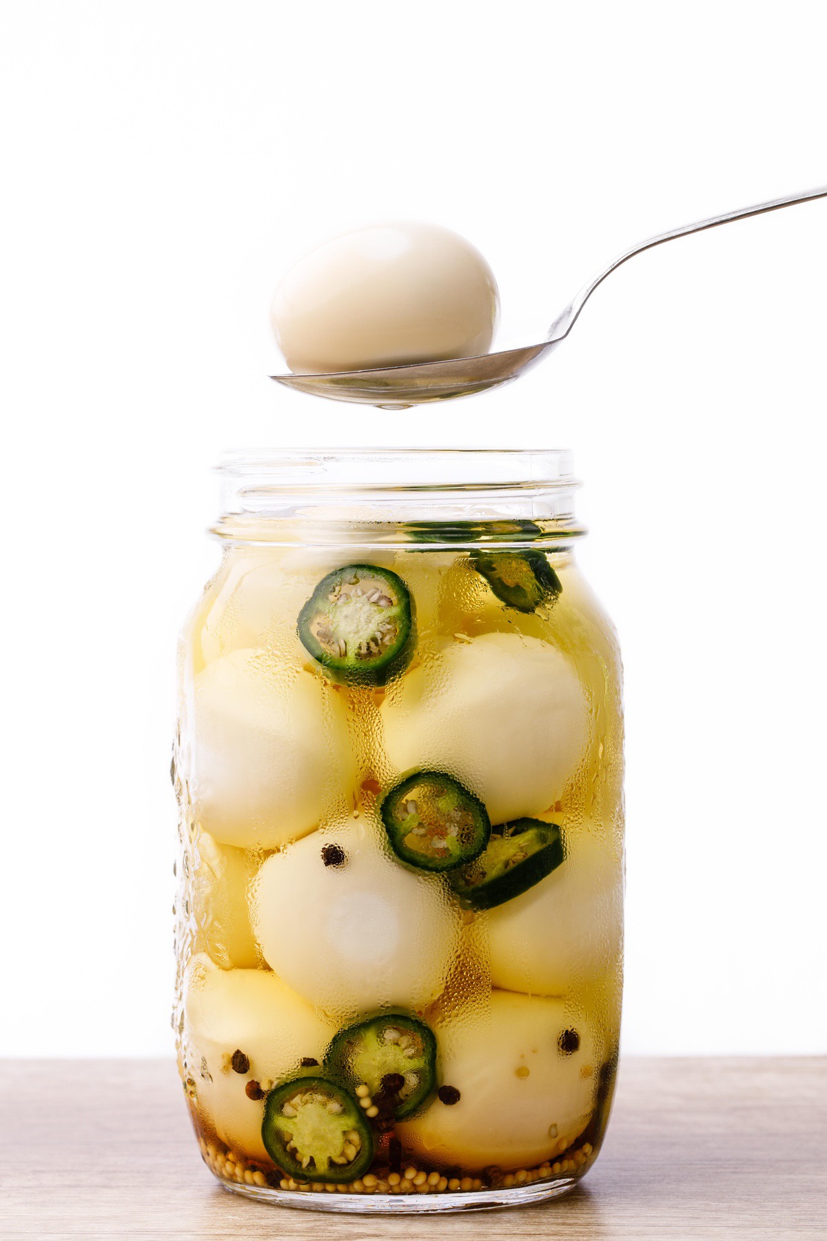Spicy Pickled Eggs In Spoon